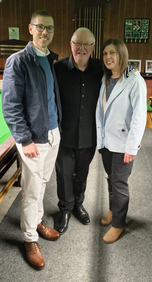Dennis Taylor This is a photo of 1985 Snooker World Champion Dennis Taylor with Paul Clark and Becky Spall at the No-Tier Snooker Society event in June 2025.