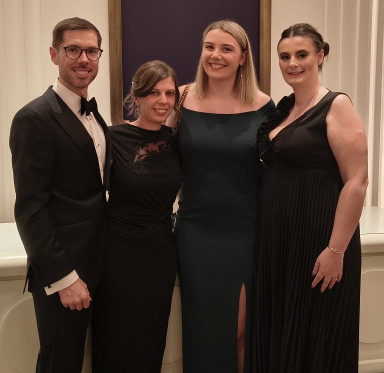 Spall Clark team in black tie. Paul Clark, Becky Spall., Natasha Yelland, Melissa Howman.