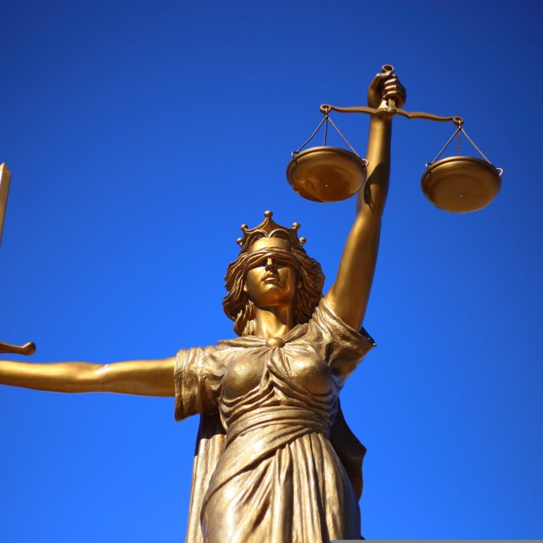 Justitia with Scales of Justice