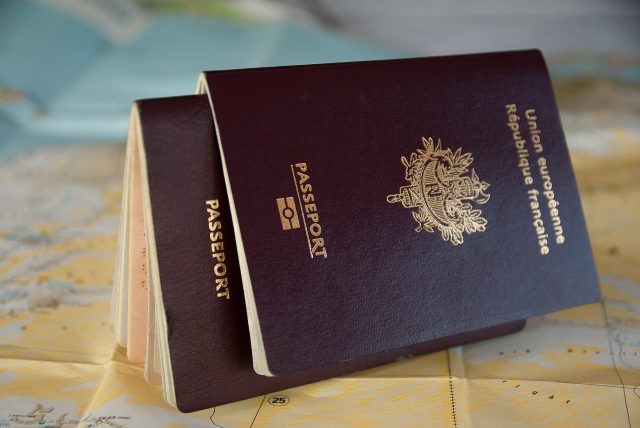 Two French Passports on a map. Image by jacqueline macou from Pixabay